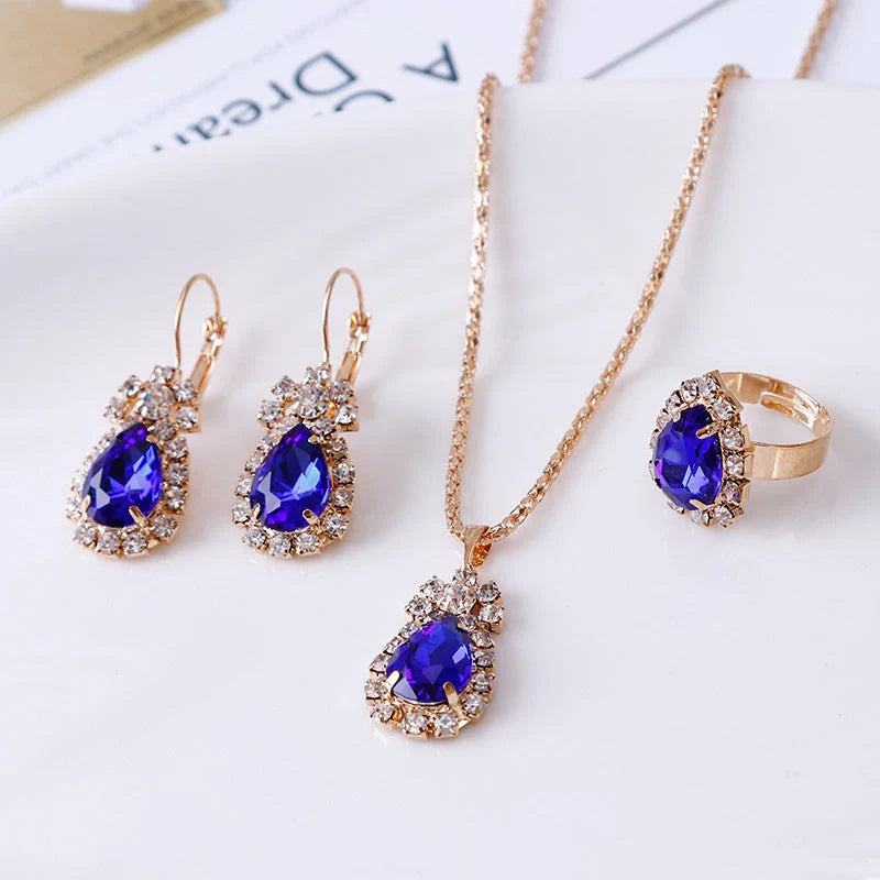 Water drop rhinestone jewellery set with adjustable necklace, earrings, and ring in various colours