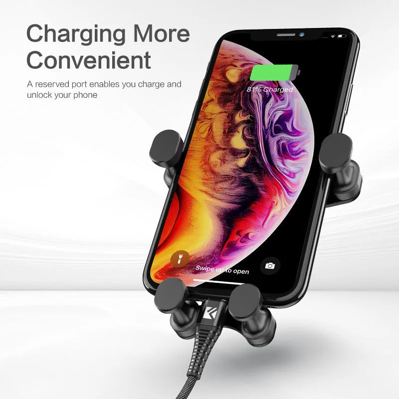 Black gravity car phone holder with 360-degree rotation ball joint mounted on a car air vent.