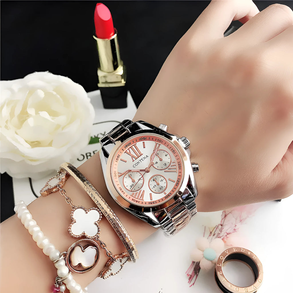 Women's silver rose gold diamond quartz analogue watch with mesh strap on wrist