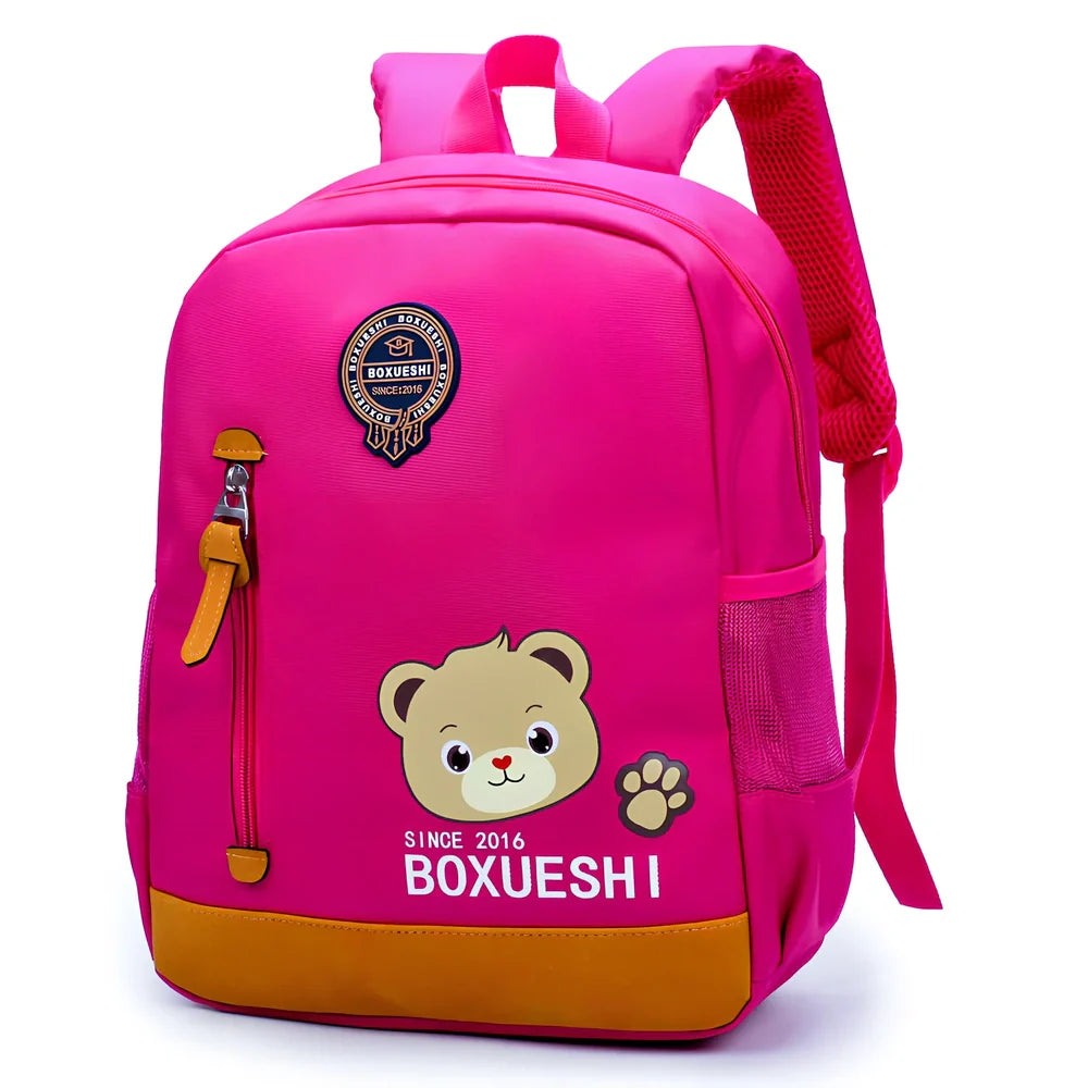 Cartoon bear nursery schoolbag in deep blue or Mei red, 25 cm high with padded straps for boys