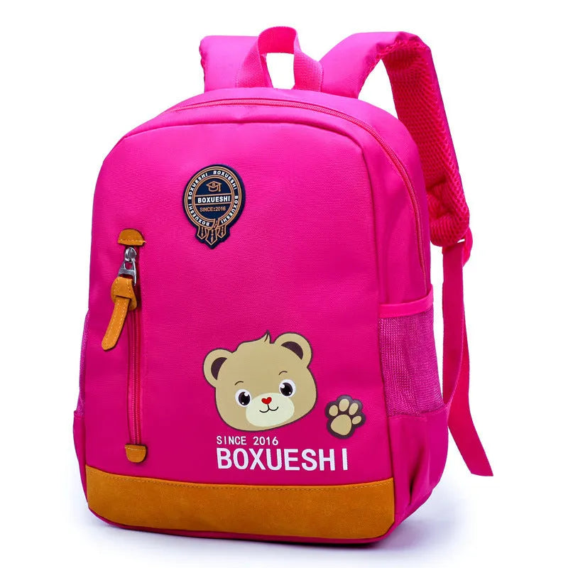 Cartoon bear children's backpack in blue or red, 24cm size for nursery school and travel.