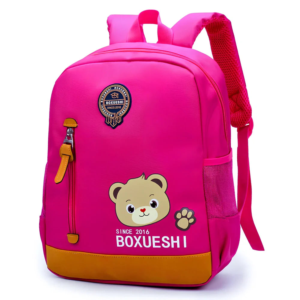 Cartoon bear nursery schoolbag in deep blue or Mei red, 25 cm high with padded straps for boys
