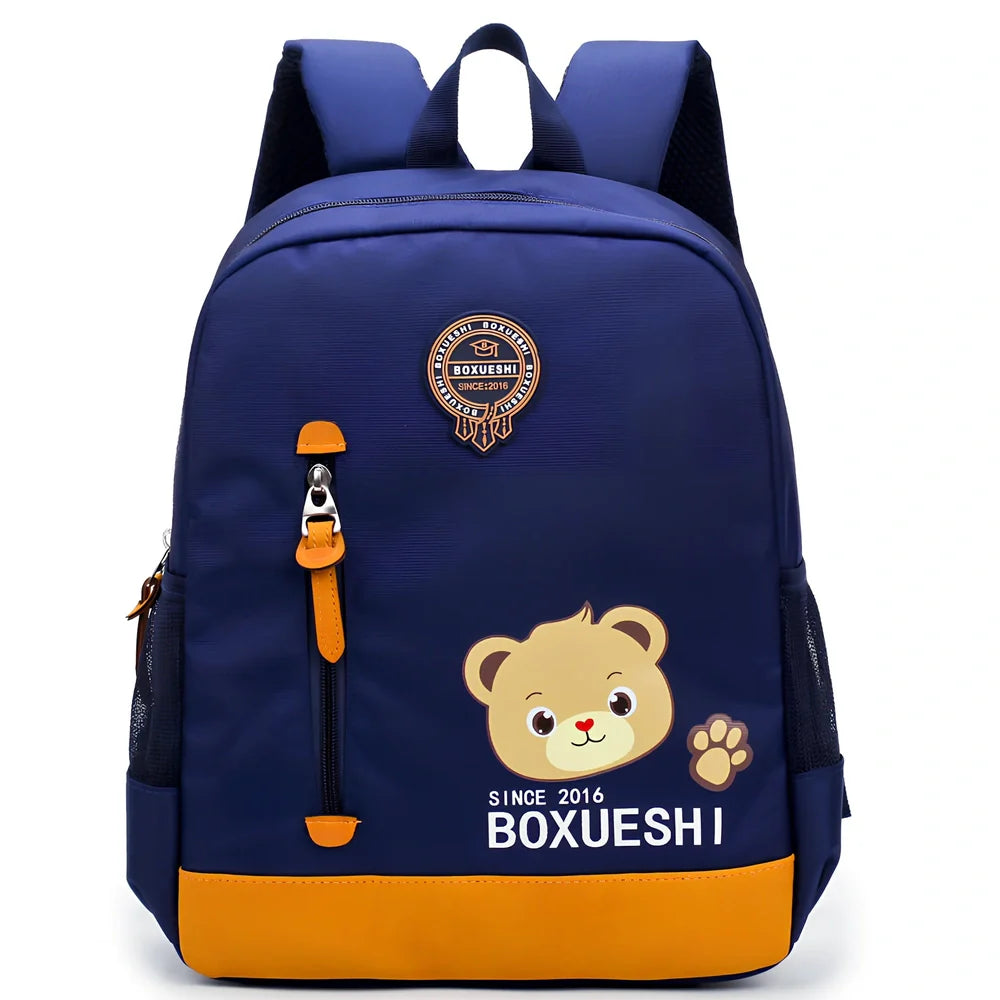 Cartoon bear nursery schoolbag in deep blue or Mei red, 25 cm high with padded straps for boys