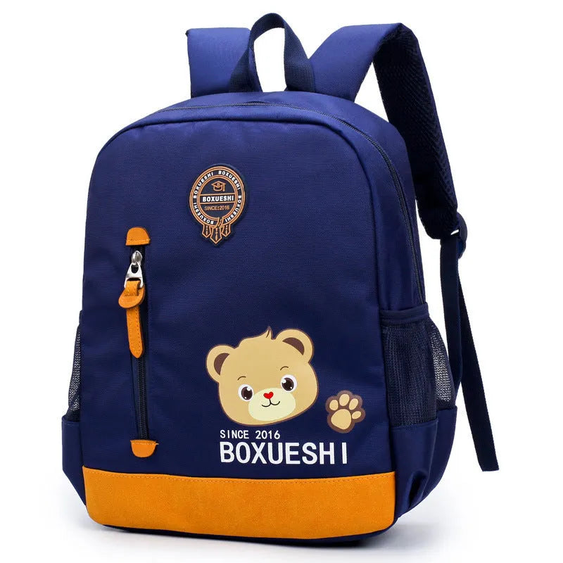 Cartoon bear children's backpack in blue or red, 24cm size for nursery school and travel.