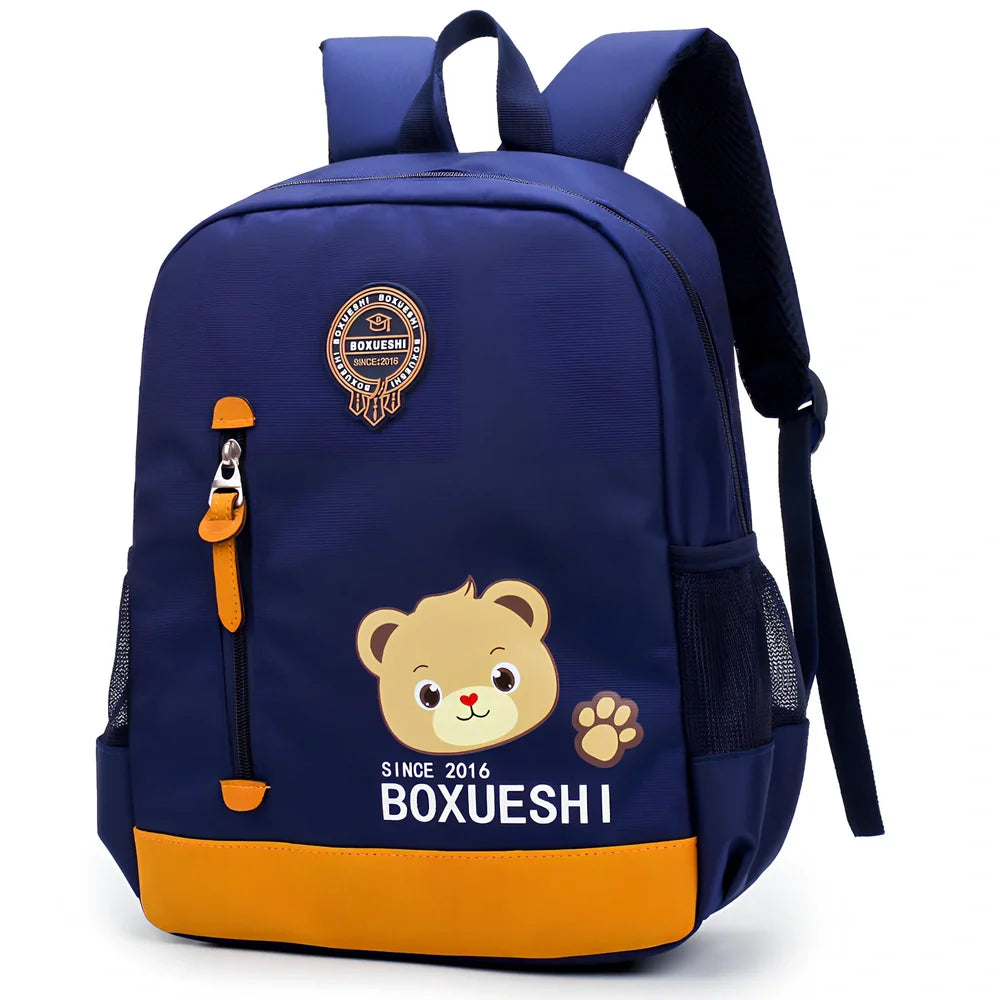 Cartoon bear nursery schoolbag in deep blue or Mei red, 25 cm high with padded straps for boys