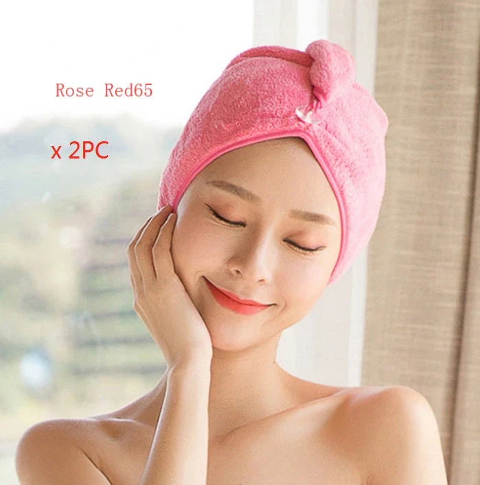 Absorbent microfiber hair turban in various vibrant colours, designed for fast and convenient drying