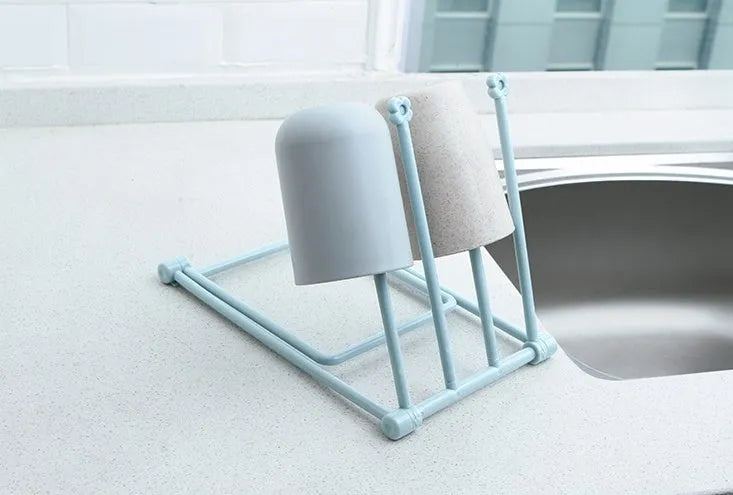 Foldable plastic dishcloth shelf in Nordic colours for kitchen bottle storage
