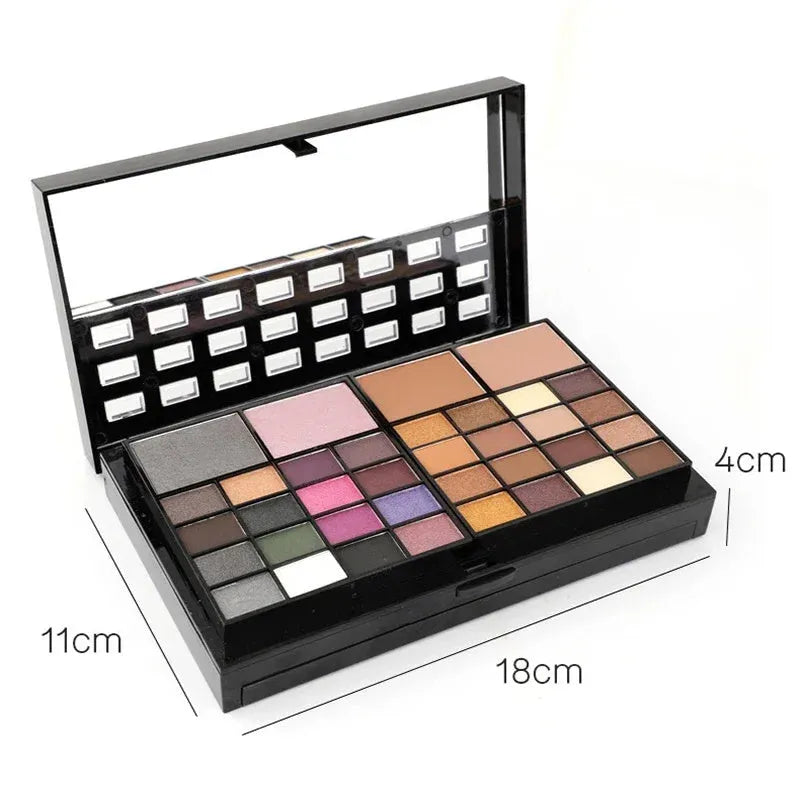 74 colour makeup palette with four layers, a mirror, and included brushes for eyeshadow, lip, and contour.