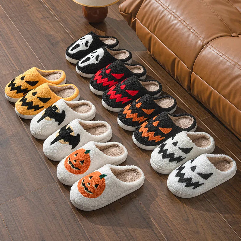 Halloween couple indoor slippers with embroidered lightning ghost face on suede upper in various colours.