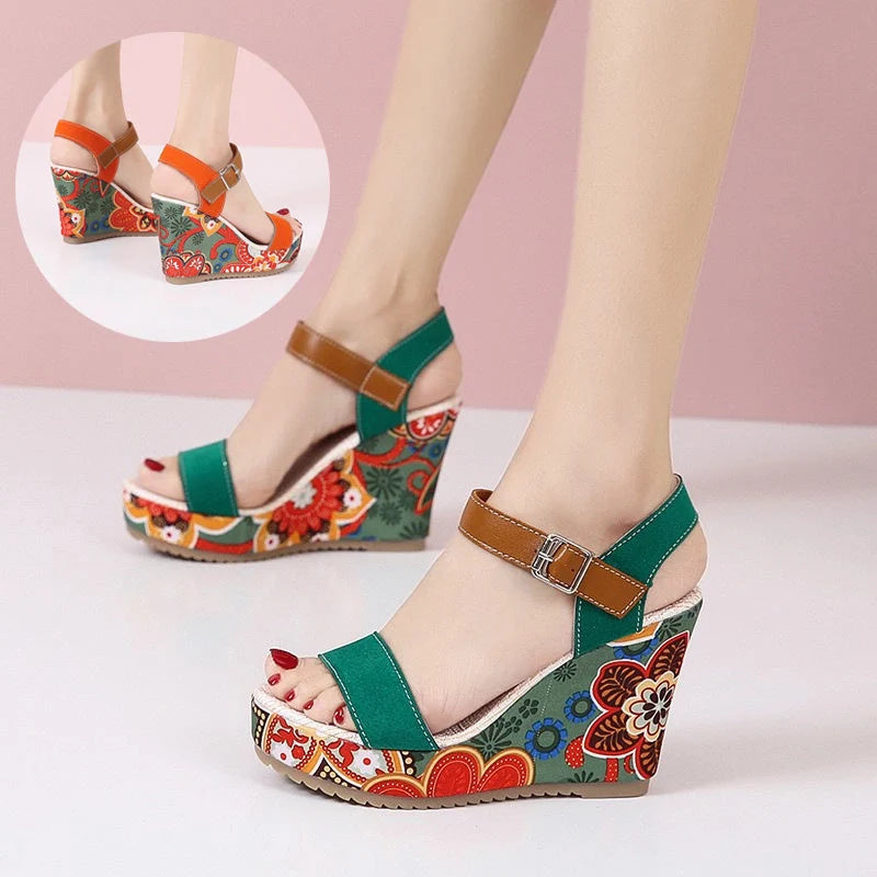 Women's floral embroidered wedge sandals in black, green, and orange with buckle strap