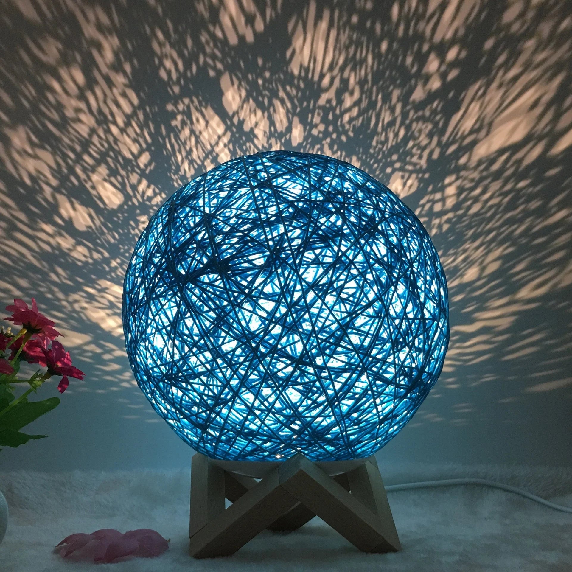 LED rattan table lamp with hand-knit lampshade in various colours