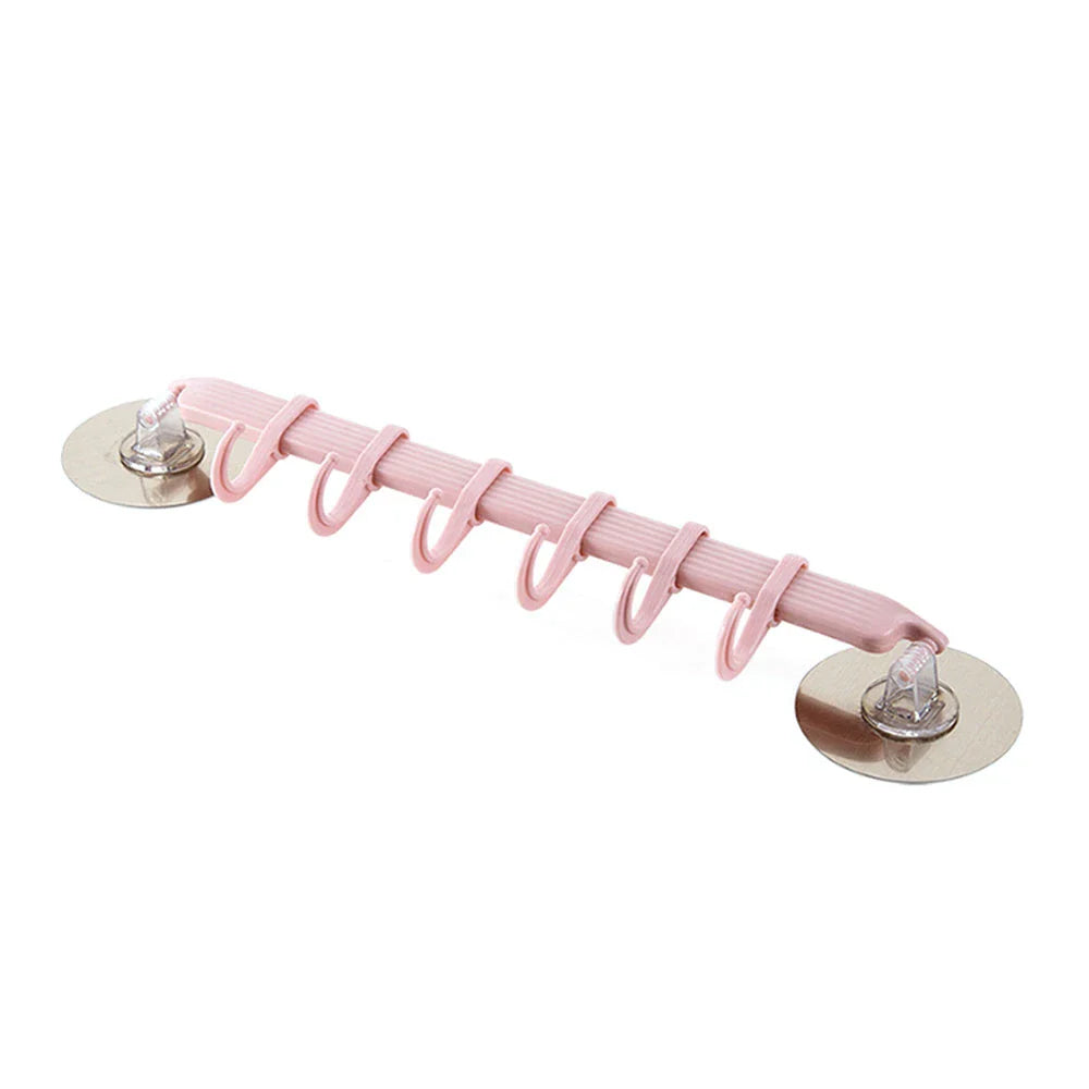 Six-link adhesive hook set for wall organisation in pink, sky blue, and white