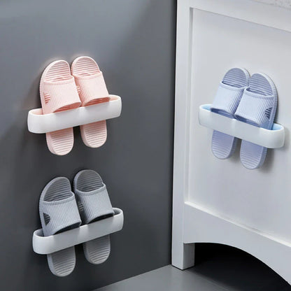 Wall-mounted bathroom slippers in pink, blue, and grey, made from 100% new plastic materials