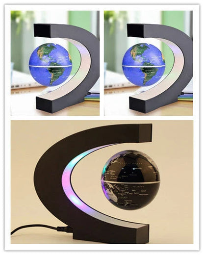 Magnetic levitation globe floating above base with LED light on