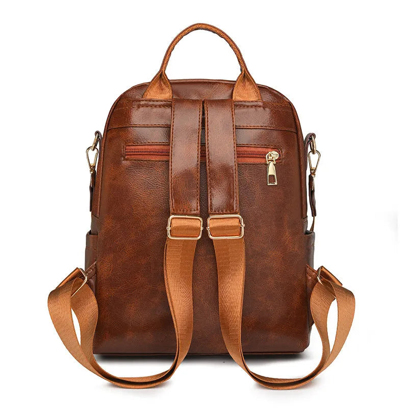 PU backpack with telescopic handle in black, square vertical shape, 24x15x31cm, sitting upright on floor