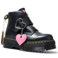 Women's black leather ankle boots with chunky heel, lace-up front, side zip, and belt buckle detail on a waterproof platform