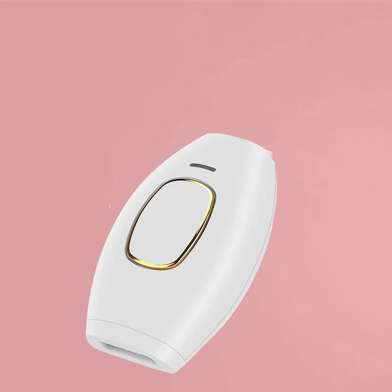 White laser hair removal device with ABS body and pink power button on light background