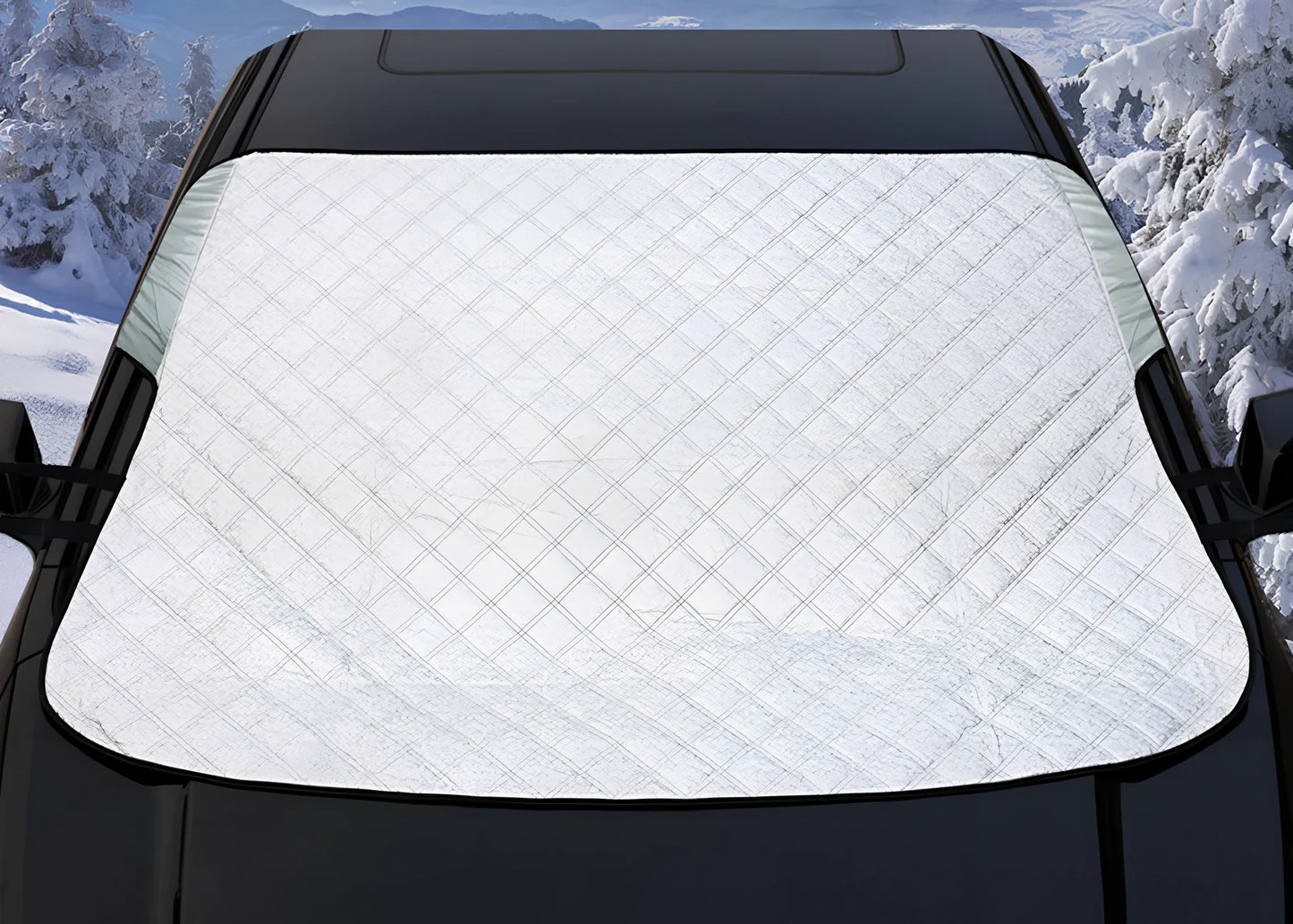 Silver magnetic windshield cover showing aluminium foil coating and edge magnets for vehicle protection