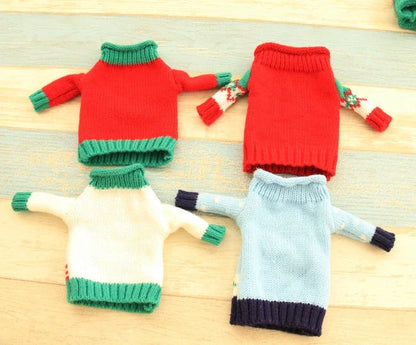 Knitted Christmas Bottle Set with festive designs including Joy, Christmas tree, elk, and snowman