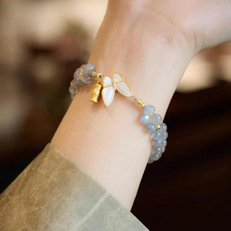 Grey moonstone geometric bracelet with butterfly woven hand rope for women.