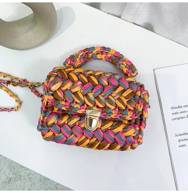 Hand knitted crochet cotton tote crossbody bag in Cotton Candy colour, horizontal square shape with lock closure and shoulder strap.