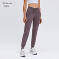 Women's high waist yoga pants with drawstring in various colours including distilled coffee and Belgian blue