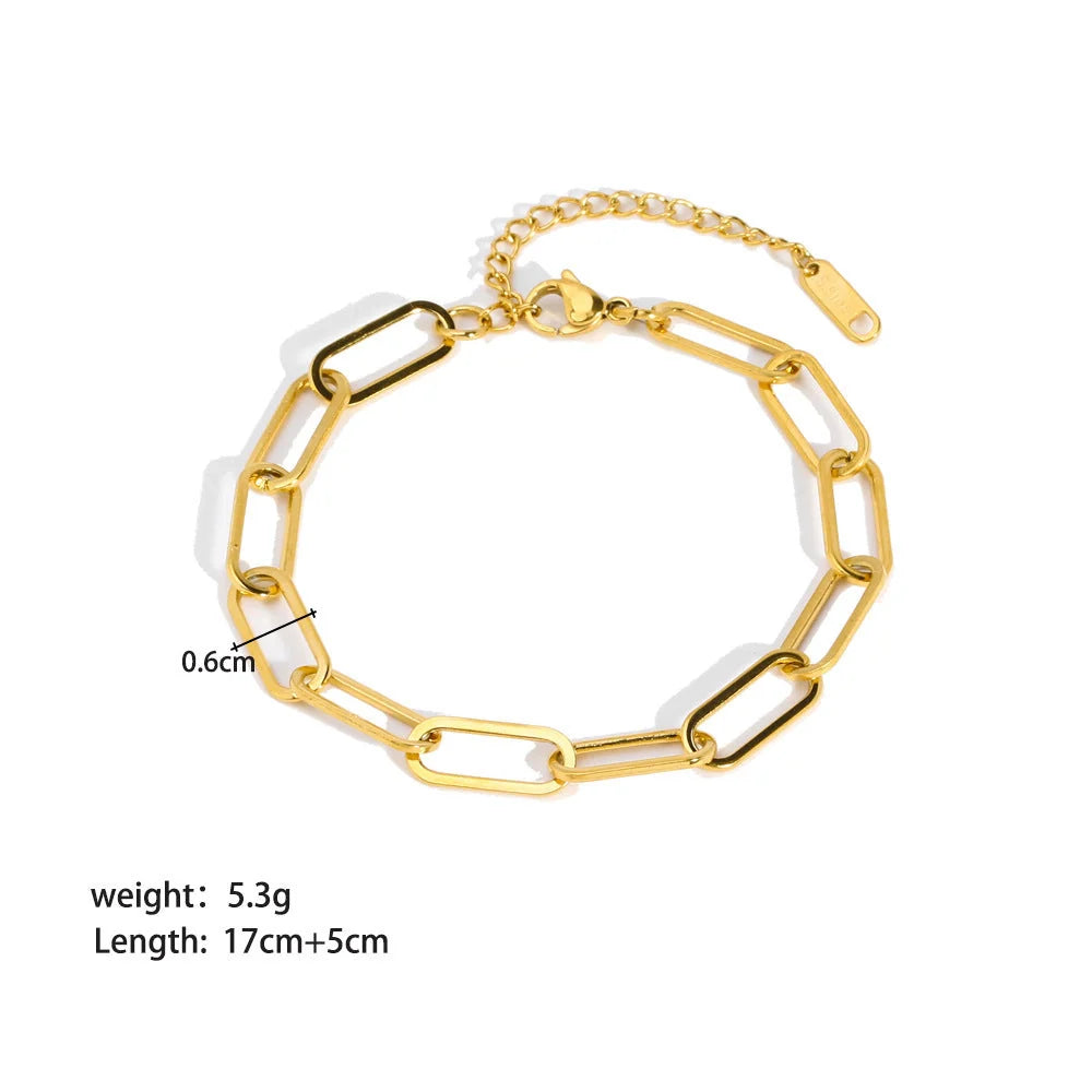 Stainless steel ornament bracelet with real gold treatment in various colours