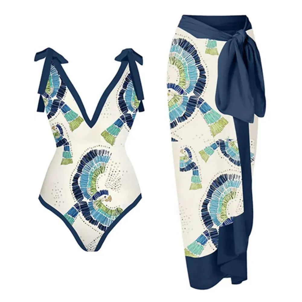 French retro blue one-piece swimsuit with gauze skirt on beach