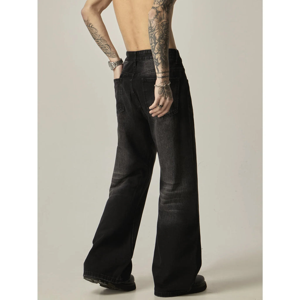 Black loose straight leg jeans with retro American styling and zipper fly