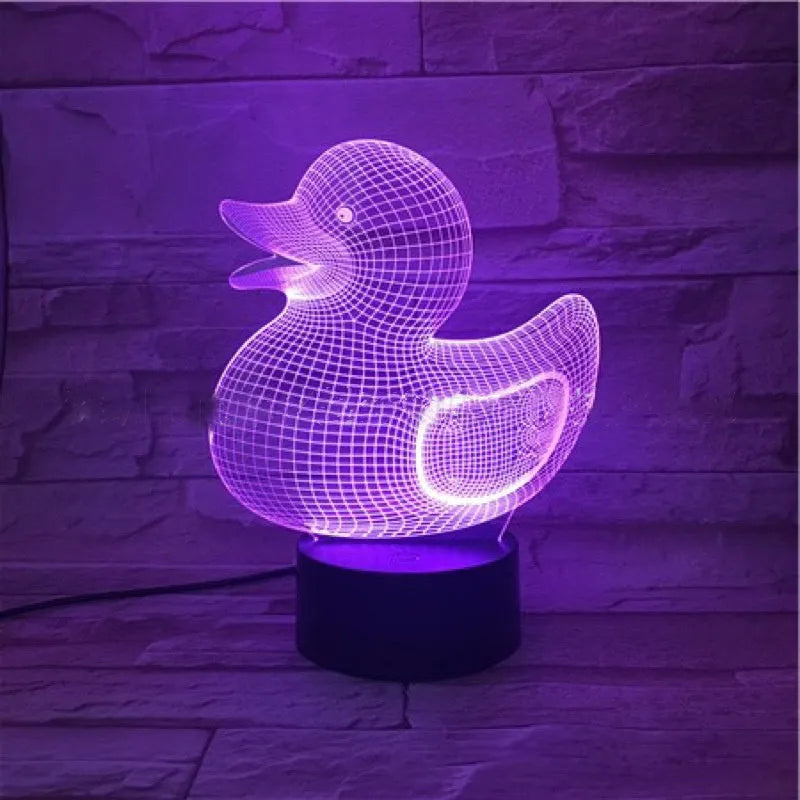 Little Yellow Duck 3D acrylic night light with colourful LED glow on an ABS base.
