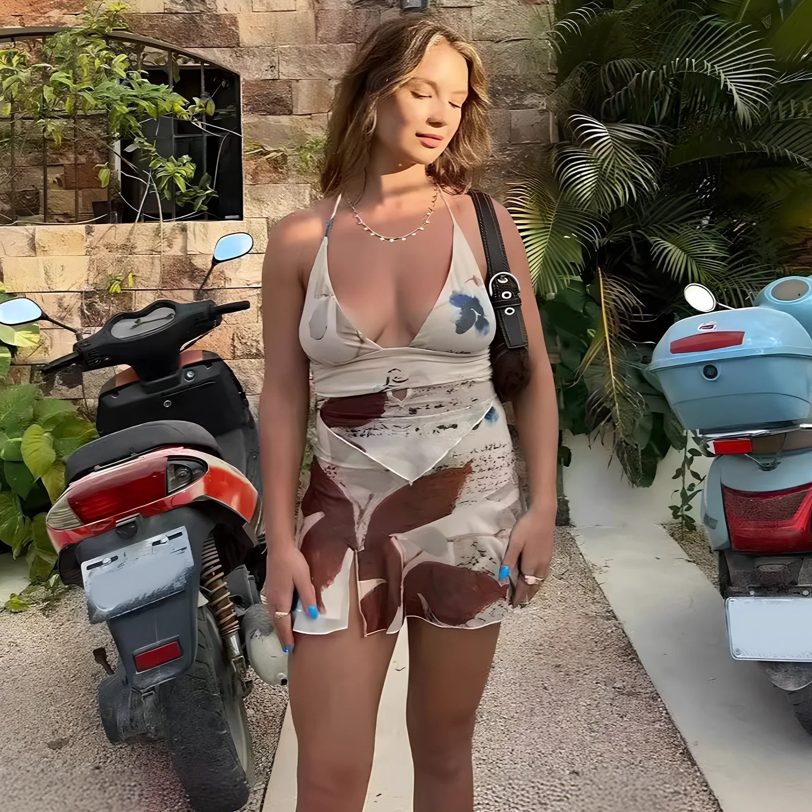 Women's two-piece printed summer dress set with V-neck halter top and pleated skirt in mesh fabric