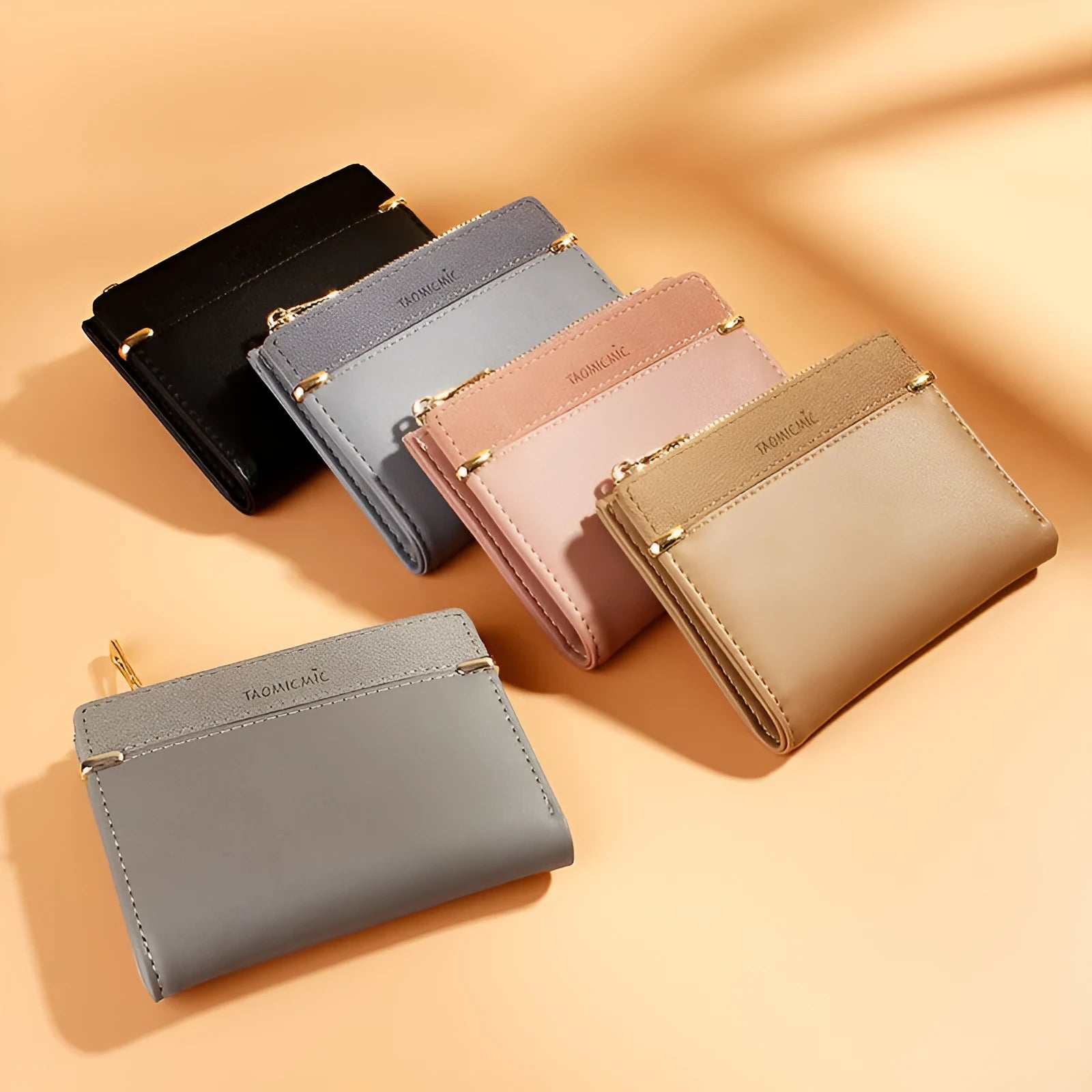 Ladies fold wallet in PU leather with zipper closure, showing internal card slots and compartments.