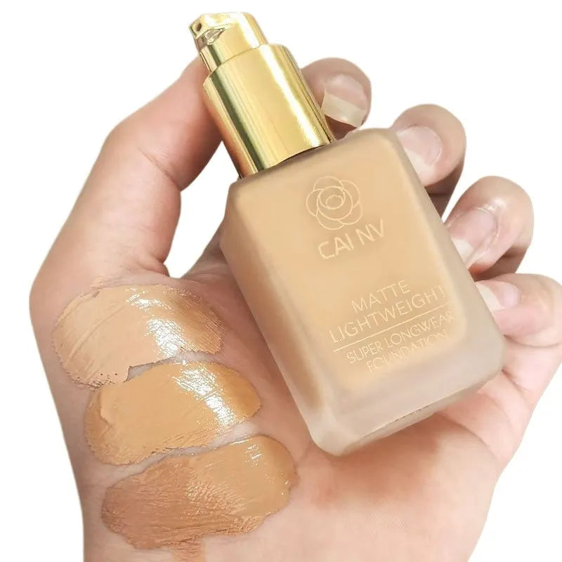 Wheat colour liquid foundation bottle with black leather blend agent for mixed skin types