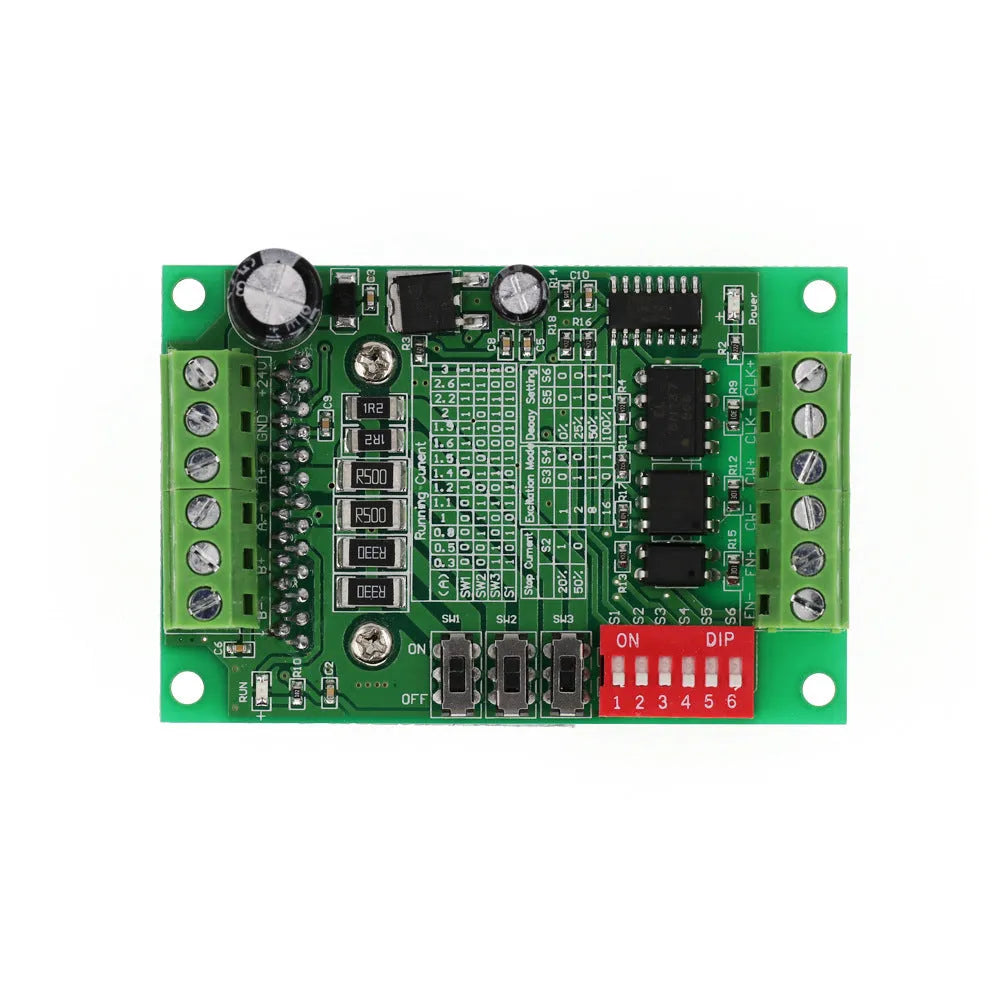 TB6560 stepper motor driver module on a green PCB with a large heatsink, showing connection terminals.