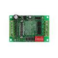 TB6560 stepper motor driver module on a green PCB with a large heatsink, showing connection terminals.