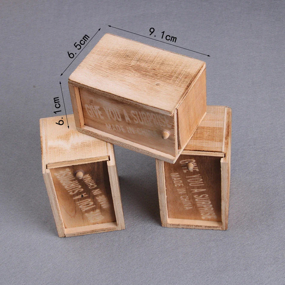 Wooden Scare Box with lifelike prank spider for April Fools' Day fun
