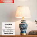 Blue and white Chinese porcelain table lamp with handmade cloth shade on copper base