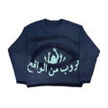 Man wearing a grey abstract print loose fit viscose sweater