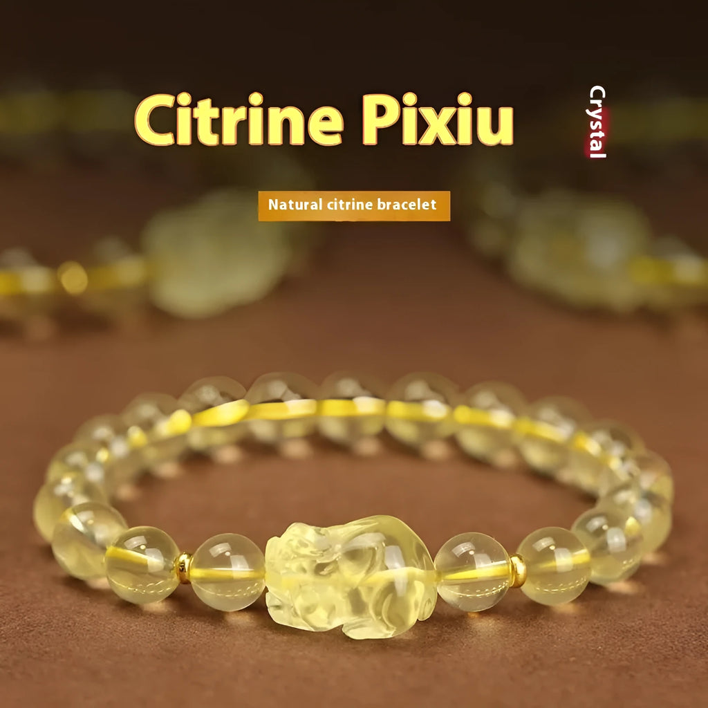 Yellow Pi Xiu bracelet with artificial crystal beads on an adjustable leather strap.