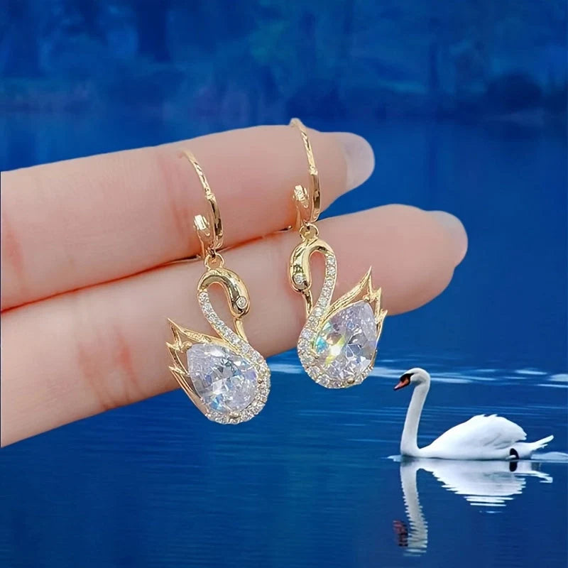 Sweet Rhinestone Swan Earrings in gold, green, and suit colours, showcasing unique design and sparkle.