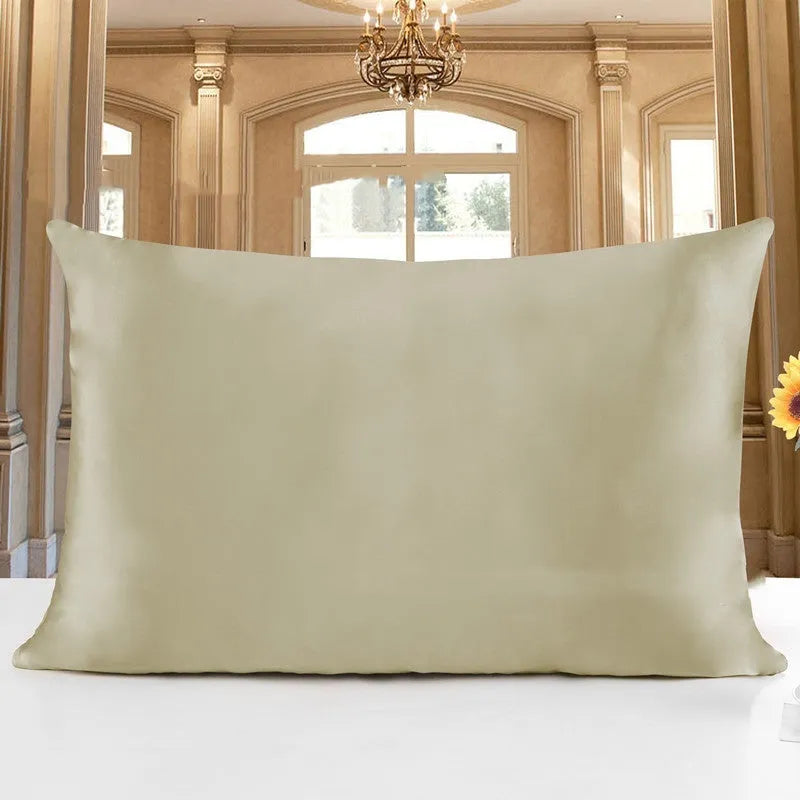 19 M double-sided silk pillowcase shown in one of 14 colours, including apricot, champagne, and navy blue.