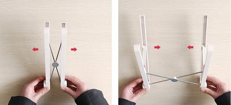 White portable laptop cooling stand with adjustable height and folding mechanism