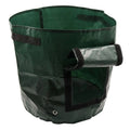 Dark green PE cloth garden planting bag with side windows and double handles on a balcony