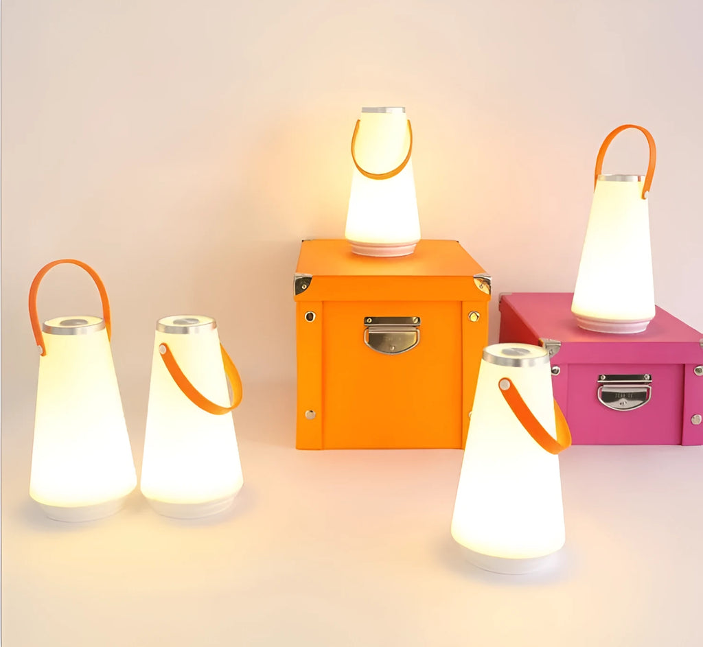 White rechargeable LED bedside lamp with warm light and adjustable brightness settings
