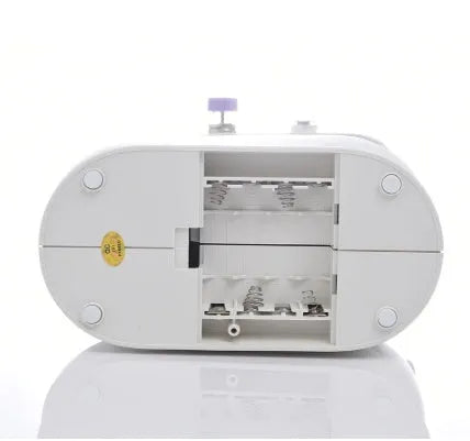 Mini electric household sewing machine with lighting and thread cutter measuring 20x15x10cm