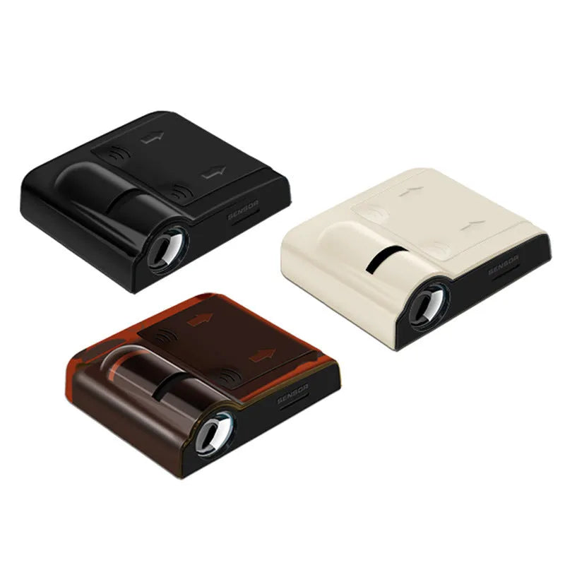 A small, square black or beige ABS plastic car projection lamp for dashboard decoration.