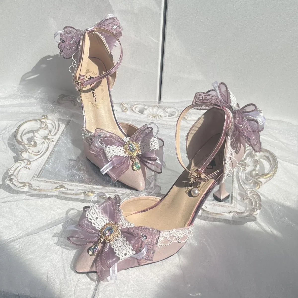 Purple satin women's wedding pumps with a flat heel and square toe.
