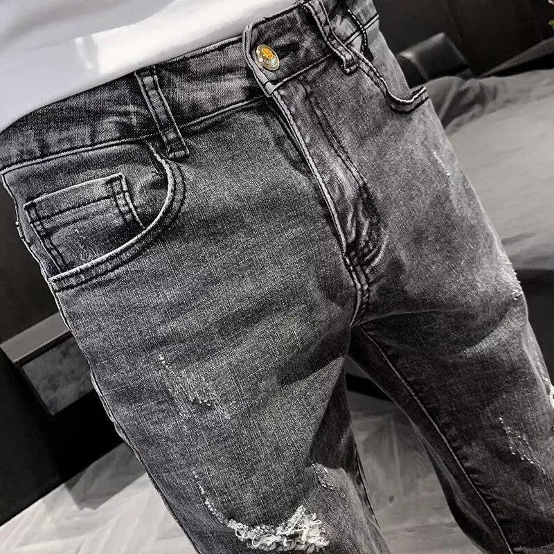 Men's high-waisted denim jeans in casual style with button fly and elastic fabric