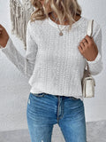 White loose fit long sleeve round neck polyester T-shirt laid flat.