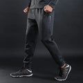 Grey and Royal Blue polyester fitness trousers with elastic waist for training and casual wear